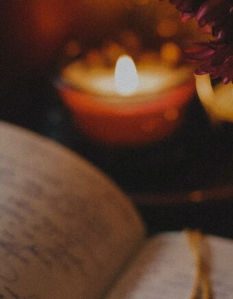 A notepad and candles