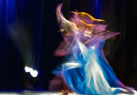 A blurry figure dancing