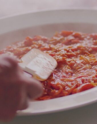 Piperade cooking in a pot