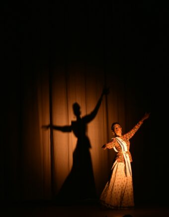 A person performs on stage