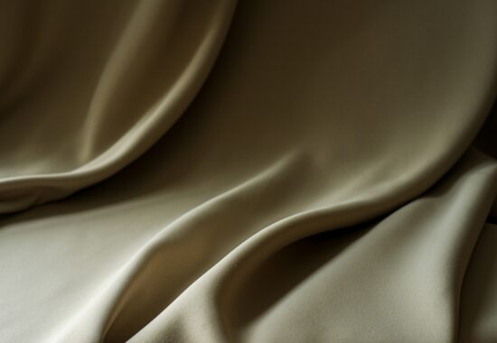A piece of fabric in a neutral green