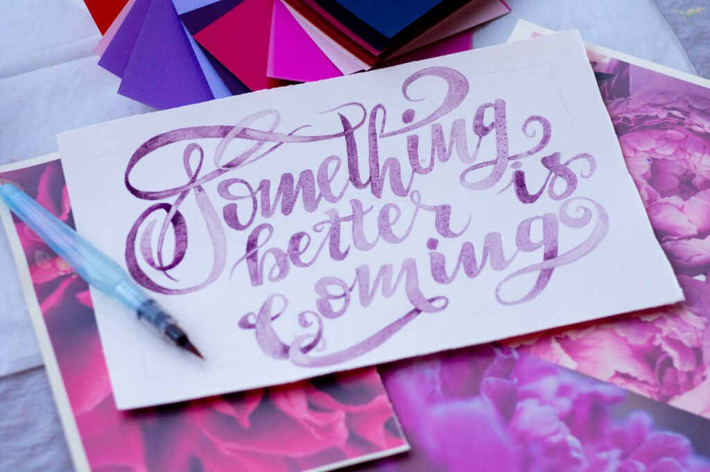card with purple caligraphy writing